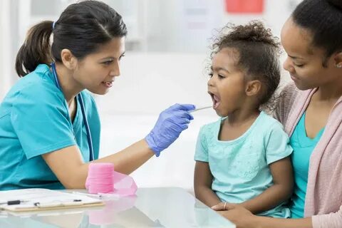A paediatrician treats children