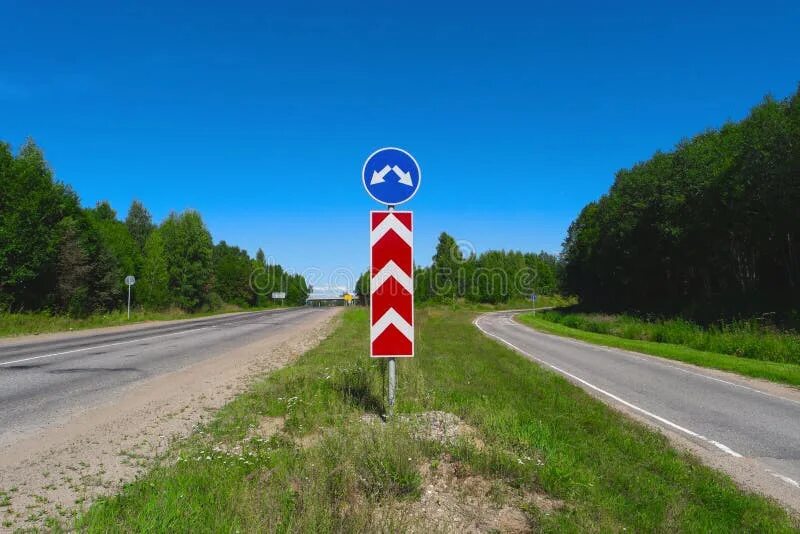 obligatory stop sign at an intersection on a country road Stock Photo - Alamy