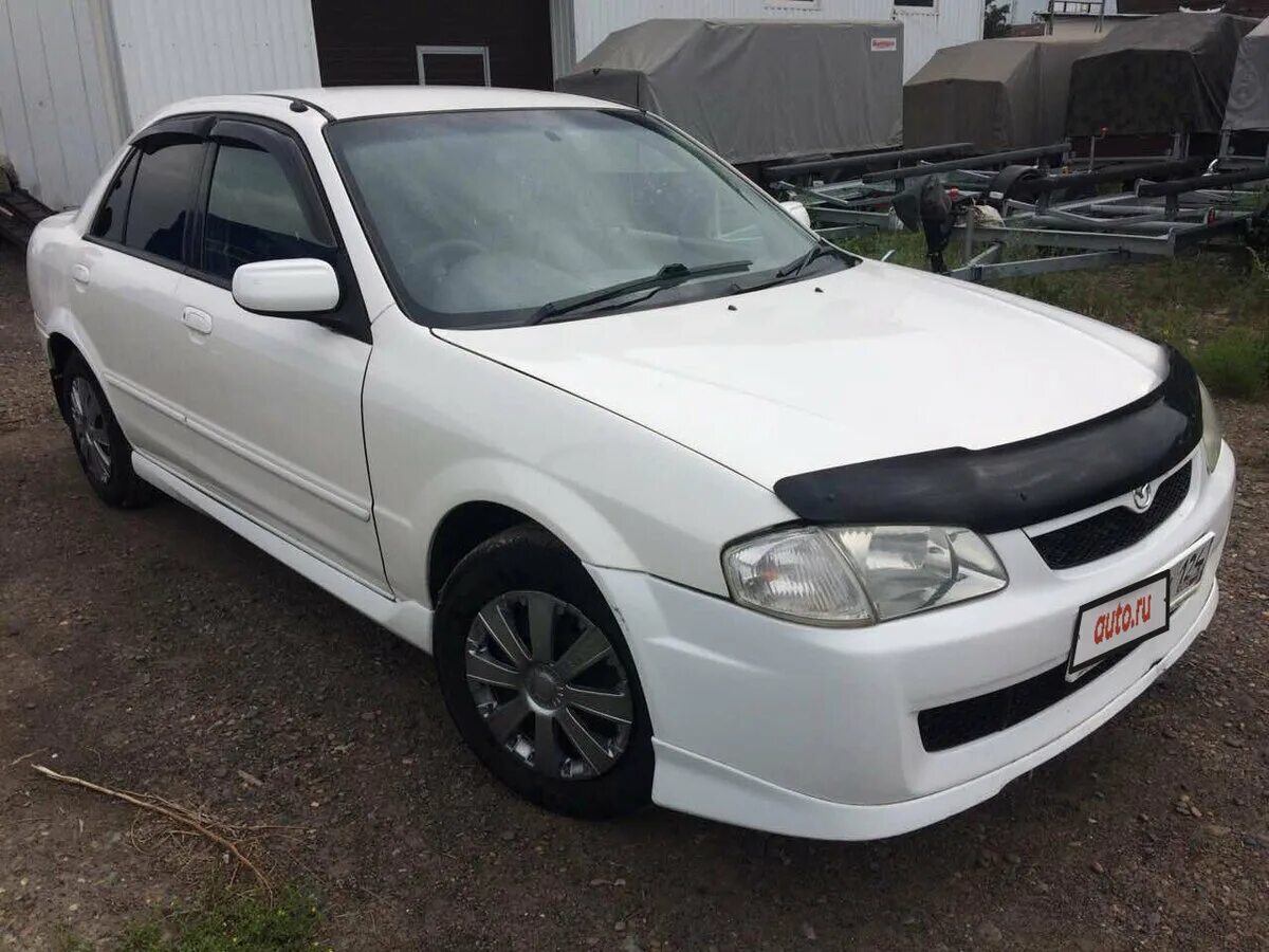 мазда фамилия 2000 седан. Mazda familia 2000 год. Mazda familia 2000 черная. Mazda familia 2000. Mazda familia 2000 седан.