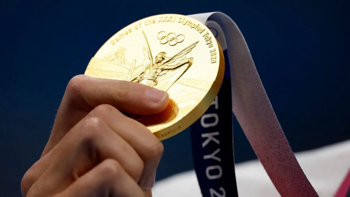 Золотая олимпийская медаль 2024. Золотая медаль олимпийских игр 2024. Олимпийские игры 2024 золото. Золотая медаль париж 2024. Золотая олимпийская медаль 2024.