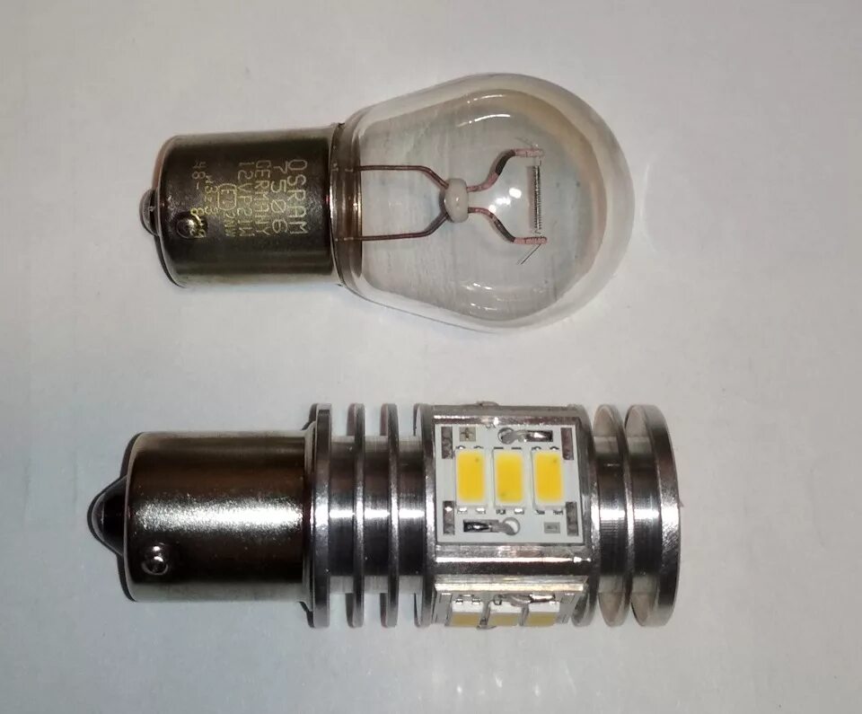 Лампочка заднего хода гранта. Марка лампочки заднего хода гранты 2190. Гранта 22 лампа стоп сигнала. Лампа заднего хода гранта 2019 цоколь. Лампа заднего номерного знака гранта.