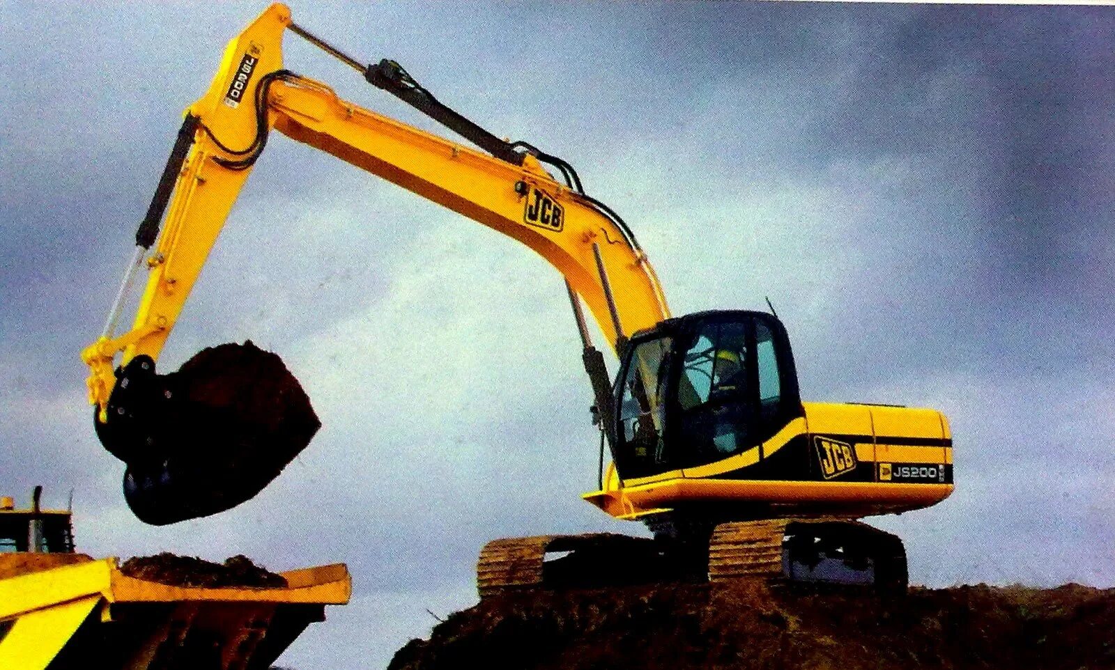 JCB js200w. JCB 200 колесный. Экскаватор Хендай 210 гусеничный. JCB Excavator 2000.