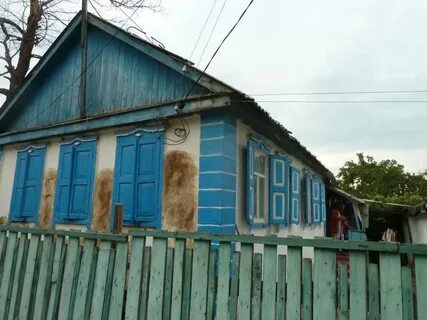 Дома в белой калитве