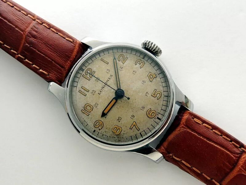 Сумы часы. Longines 1940. Часы Longines 1942. Часы лонжин 1942. Longines 1914.