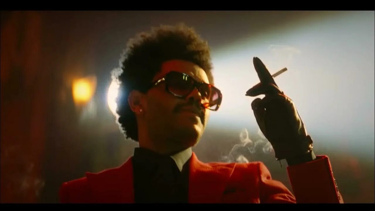 Weeknd blinding lights. The weeknd blinding lights. the weeknd в красном. weeknd в красном костюме. the weeknd в красном пиджаке.