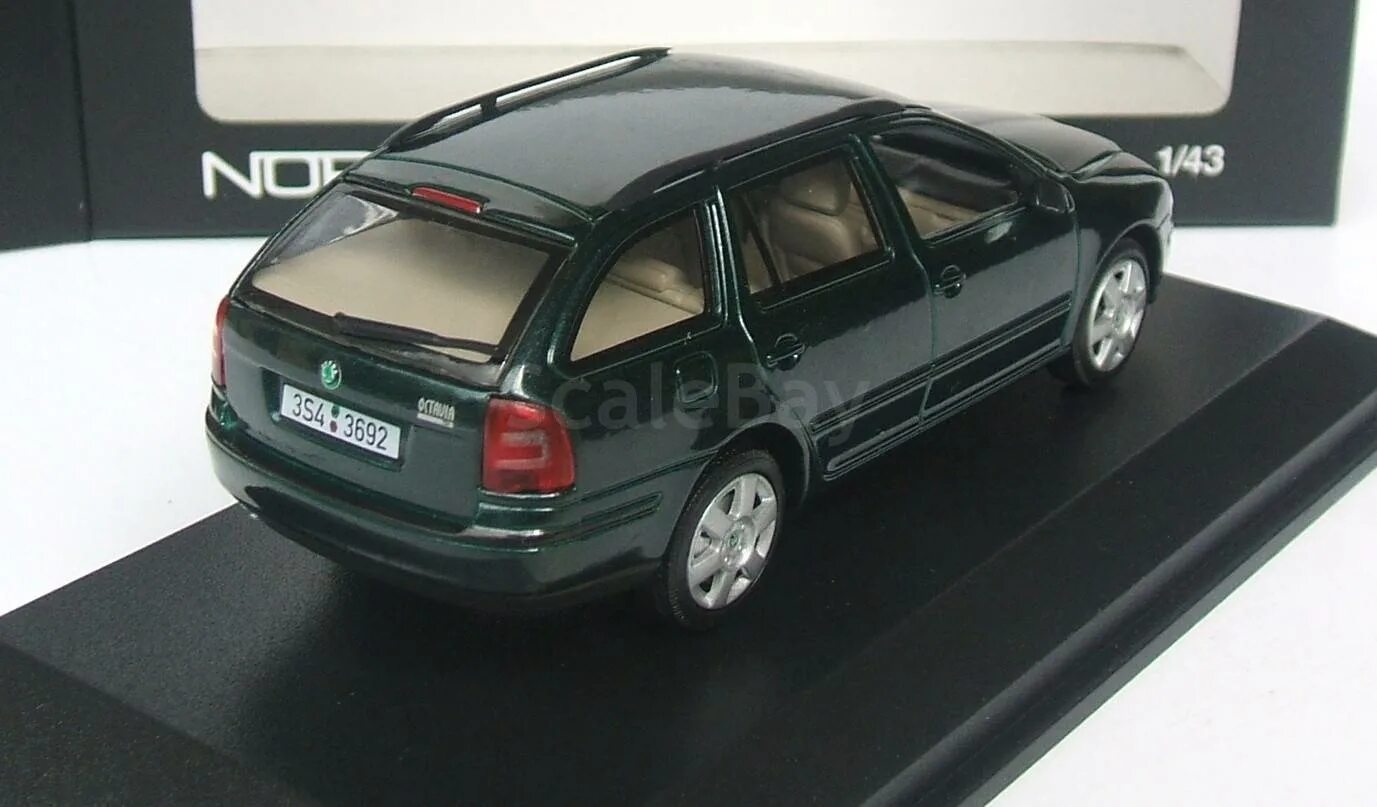 Шкода рапид игрушка. Skoda octavia tour масштабная модель. Skoda octavia a4 1:43. Skoda octavia 1 1/43. Модели skoda 1 43.