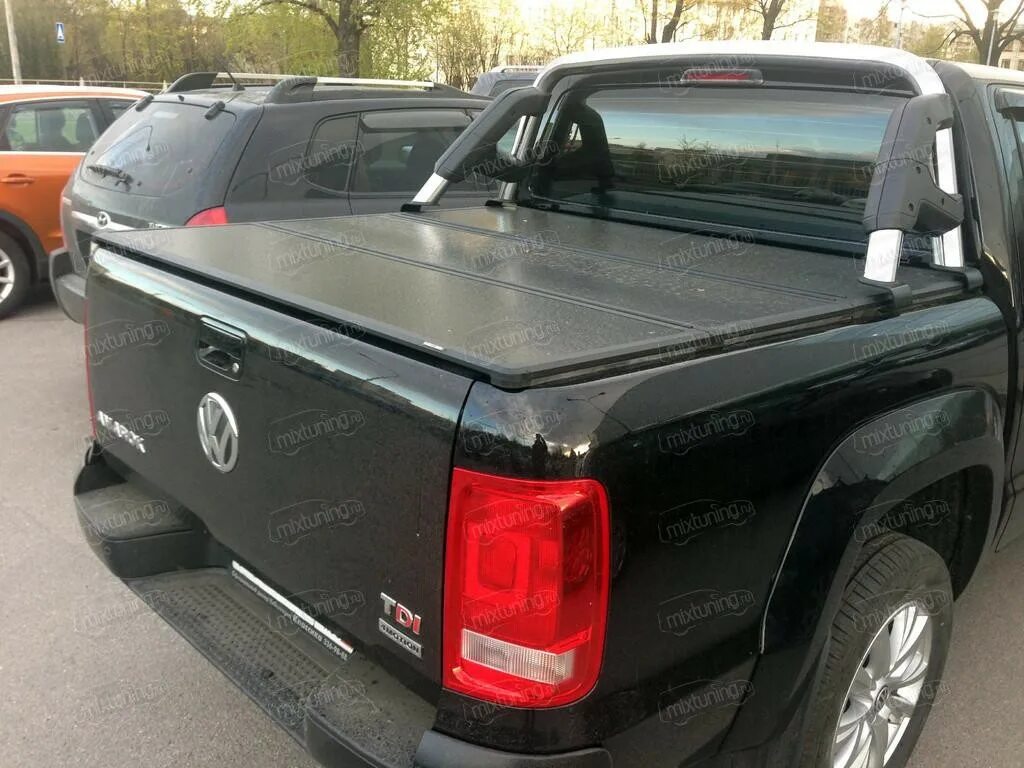 Volkswagen Amarok 2010- крышка кузова роллета. Volkswagen Amarok крышка кузова. Крышка кузова Фольксваген Амарок. Крышка кузова на пикапа Фольксваген Амарок. Крышка на кузов пикапа