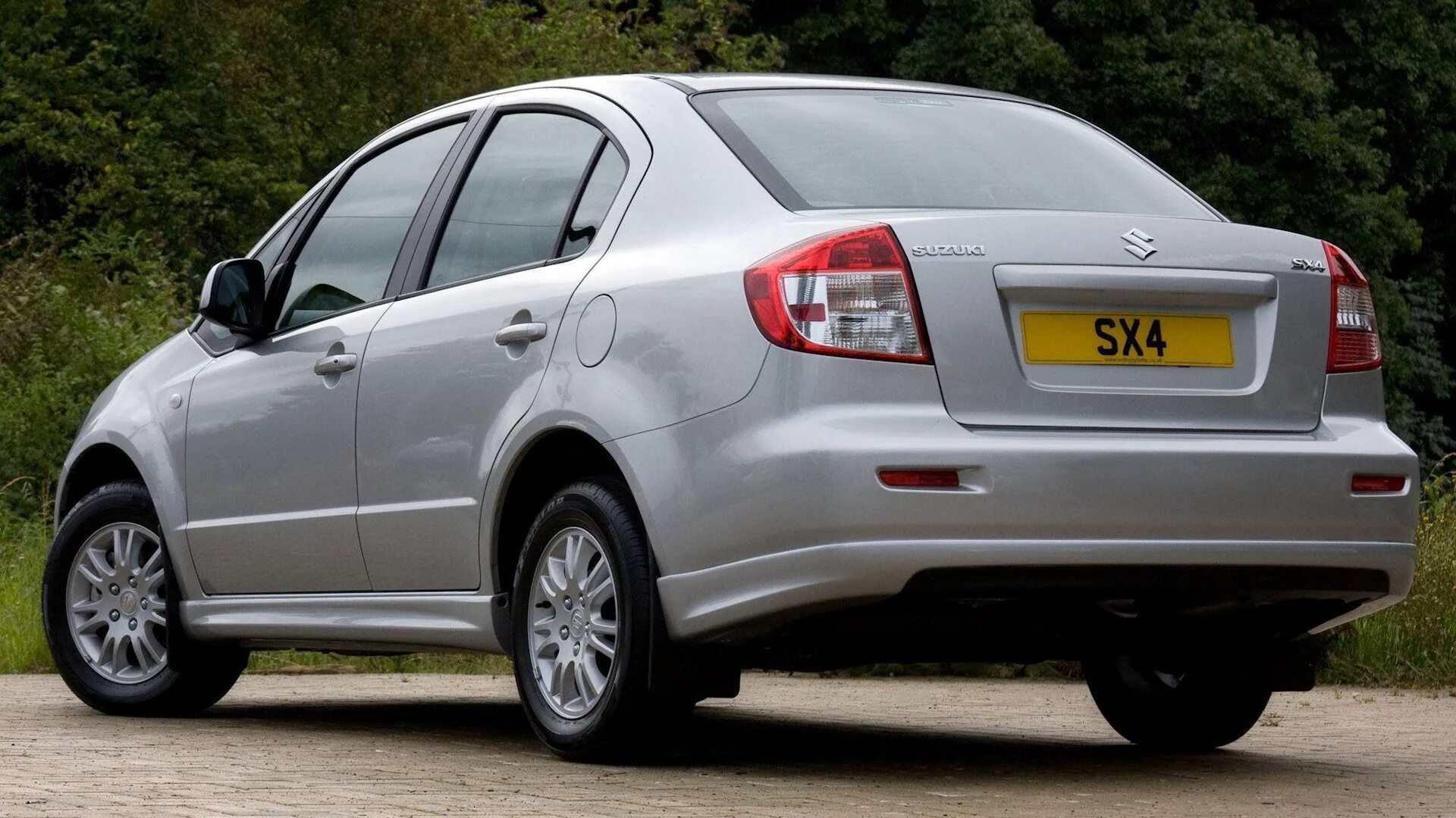 Suzuki sx4 2008 седан. Сузуки сх4 седан. Сузуки седан 4х4. Suzuki sx4 sedan. Сузуки с икс 4 седан.