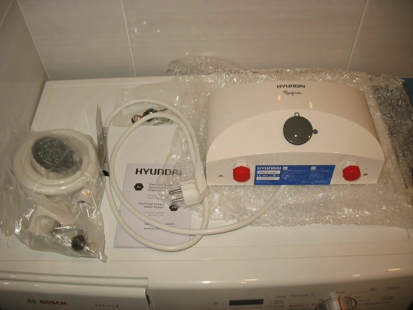 Hyundai h iwr2 3p ui074 c. Проточный электрический водонагреватель hyundai h-iwr1-3p-ui057/s. проточный электрический водонагреватель hyundai h-iwr1-3p-ui056/c. проточный водонагреватель hyundai rainforest. проточный водонагреватель rx-011-1.