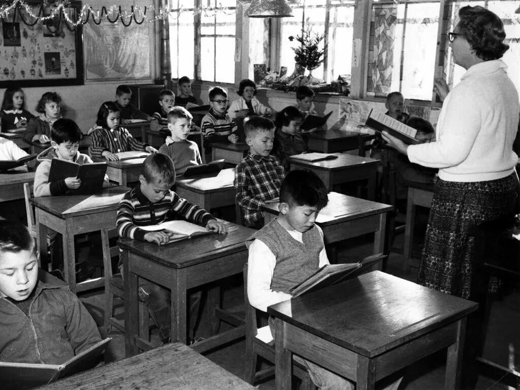 Classroom. Schools in the past. Schools in 50s. Schools 50 years ago. He school this year