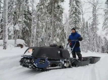 Мотособака по глубокому снегу