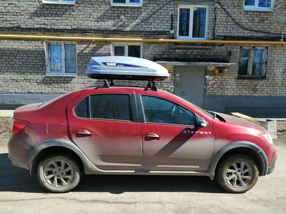 Рено Логан степвей багажник. Багажник на крышу Logan Stepway. Рено Логан стап Вей багажник. Рено Логан степвей автобокс.