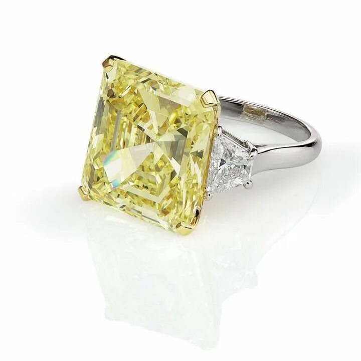 Yellow diamond engagement rings Fancy Vivid Yellow Diamond Ring with side stones