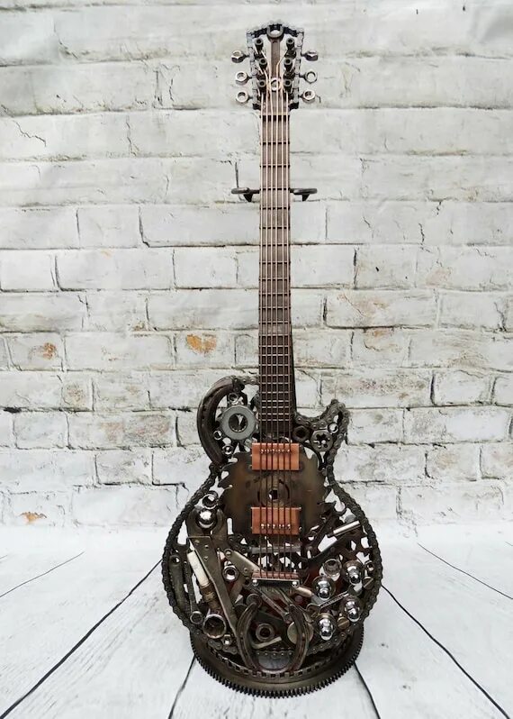Металлическая гитара купить. Кованая гитара. Гитара из металла. Электрогитара для металла. Гитара ковка.