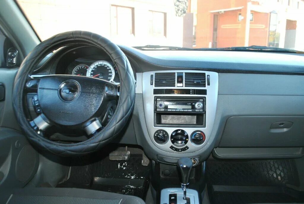 Панель лачетти универсал. Chevrolet Lacetti 2007 салон. Chevrolet Lacetti седан 2007 автомат. Chevrolet Lacetti 2007 седан салон. Шевроле Лачетти 2007 седан 1.6.