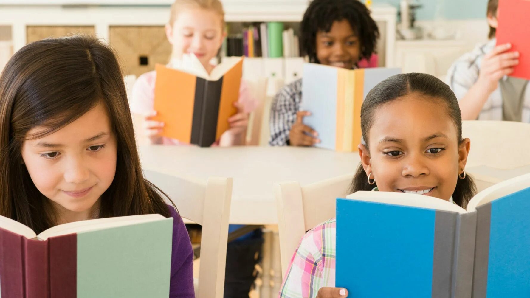 Classroom in a book. Reading in the classroom. we are reading. they are reading a book. read books, they.