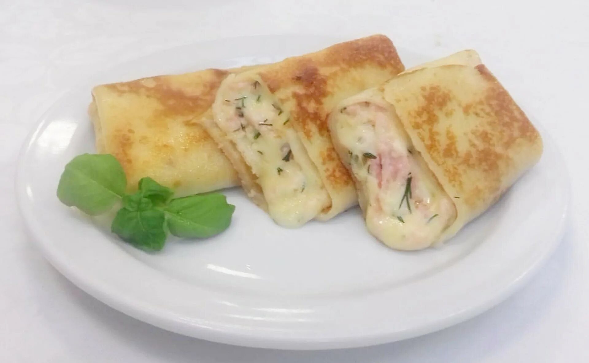 блины с ветчиной и сыром. блины фаршированные ветчиной. блины фаршированные ветчиной и сыром. блины фаршированные ливером. блинчики фаршированные ветчиной и сыром.