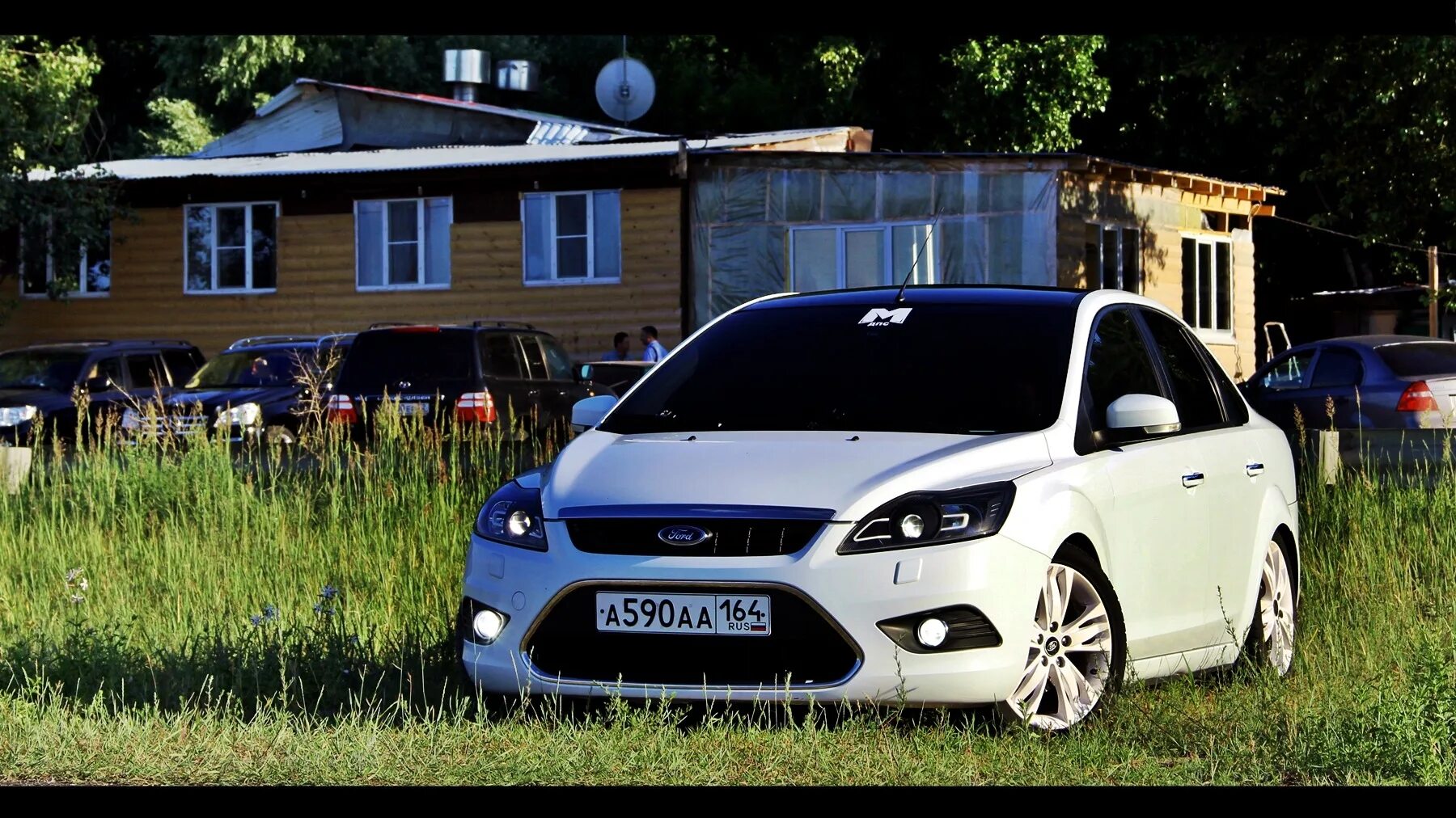 Форд фокус хлопок. Ford Focus 2 седан. Ford Focus 2 Рестайлинг 2. Форд фокус 2 седан белый. Ford Focus 2 Рестайлинг Tuning.