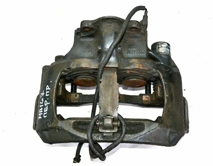 Суппорт ман. Суппорт тормозной ман 8-163. Суппорт ман тгс 19. Колодки man tga суппорт knor. Суппорт тормозной ман тга задний.