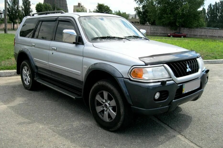 Мицубиси паджеро года выпуска. Mitsubishi Pajero Sport 2005. Митсубиши Паджеро спорт 2005. Митсубиси Паджеро спорт 2005 года. Mitsubishi Montero Sport 2005.