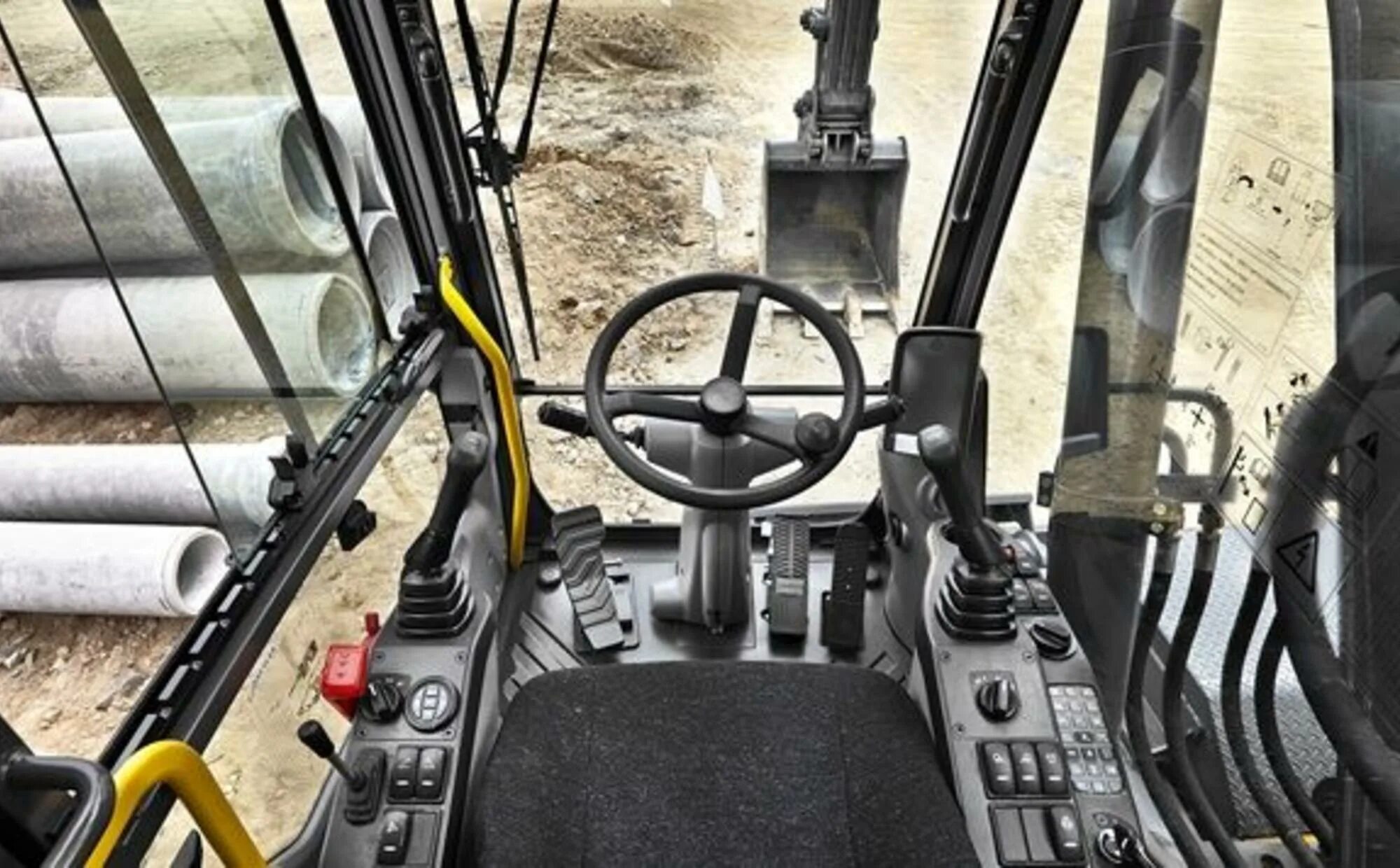 Volvo ew205d. Колесный экскаватор Volvo ew205d. JCB 205 экскаватор кабина. Экскаватор Вольво 205. Джойстик ковша