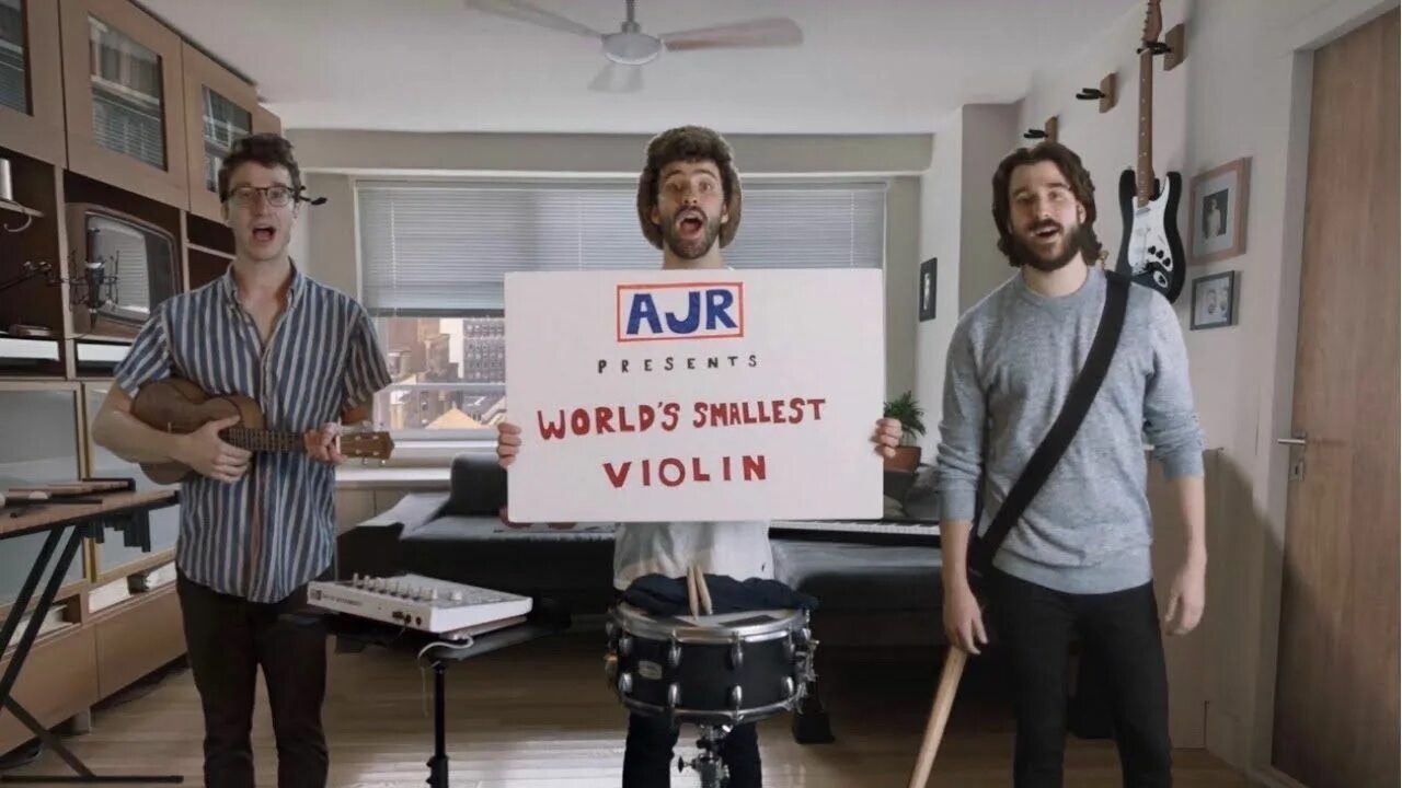 Реальный мир песня. World's smallest Violin AJR. World smallest Violin. World s smallest Violin Song. AJR World's smallest Violin текст.