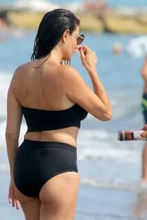 Ilaria D’amico in Black Bikini on the beach in Toscana. 