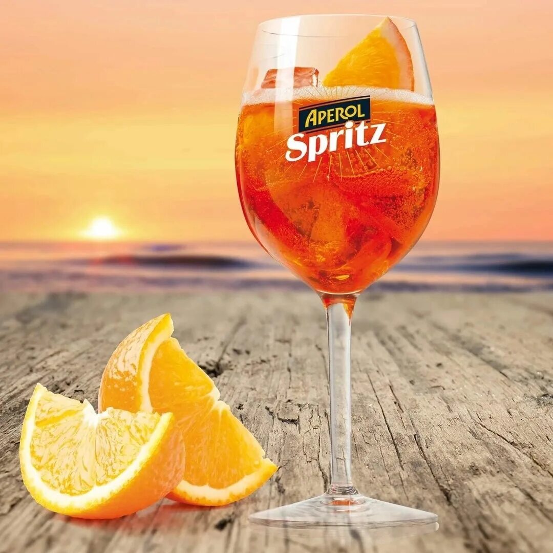 Биттер Апероль. Апероль шприц. Апероль шприц коктейль. Aperol Spritz коктейль. Бокалы для апероля