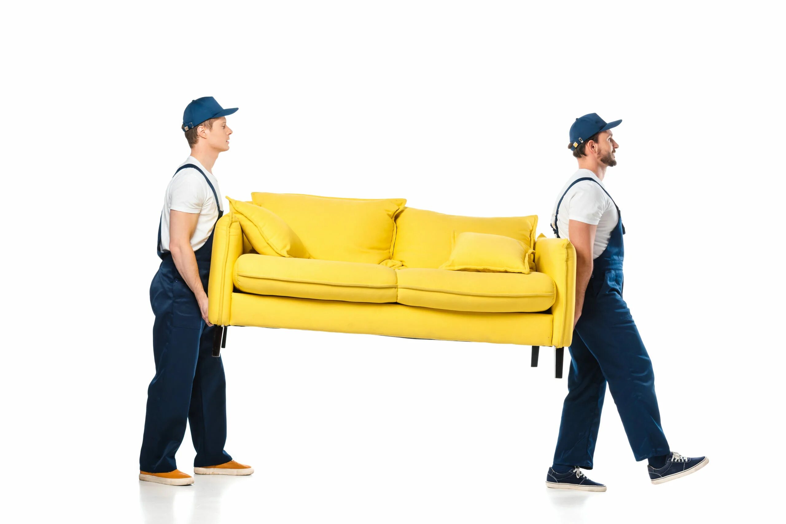 Грузчики диван. Грузчик мягкой мебели. Мужчина на желтом диване. Грузчики мужчина на желтом фоне.