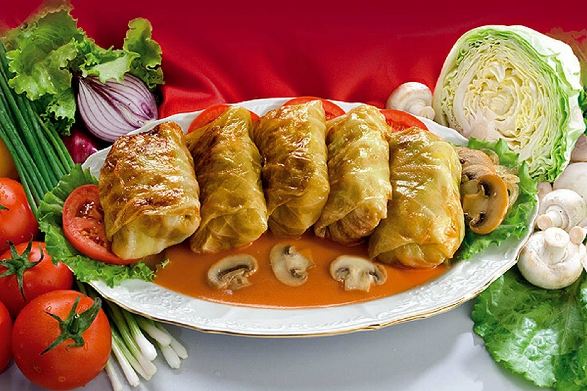 Мясо в капустных листьях рецепт