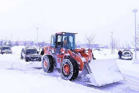Чистка снега погрузчиком