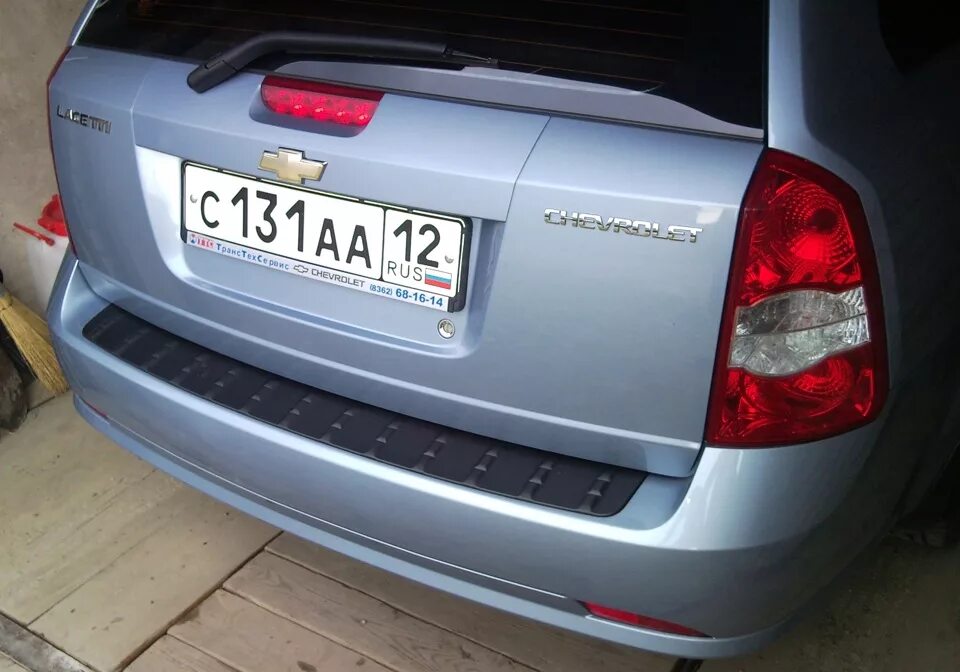 Задний бампер лачетти универсал. Chevrolet lacetti накладка на задний бампер. lacetti универсал накладка. накладка заднего бампера lacetti sw. накладка на задний бампер chevrolet lacetti седан.