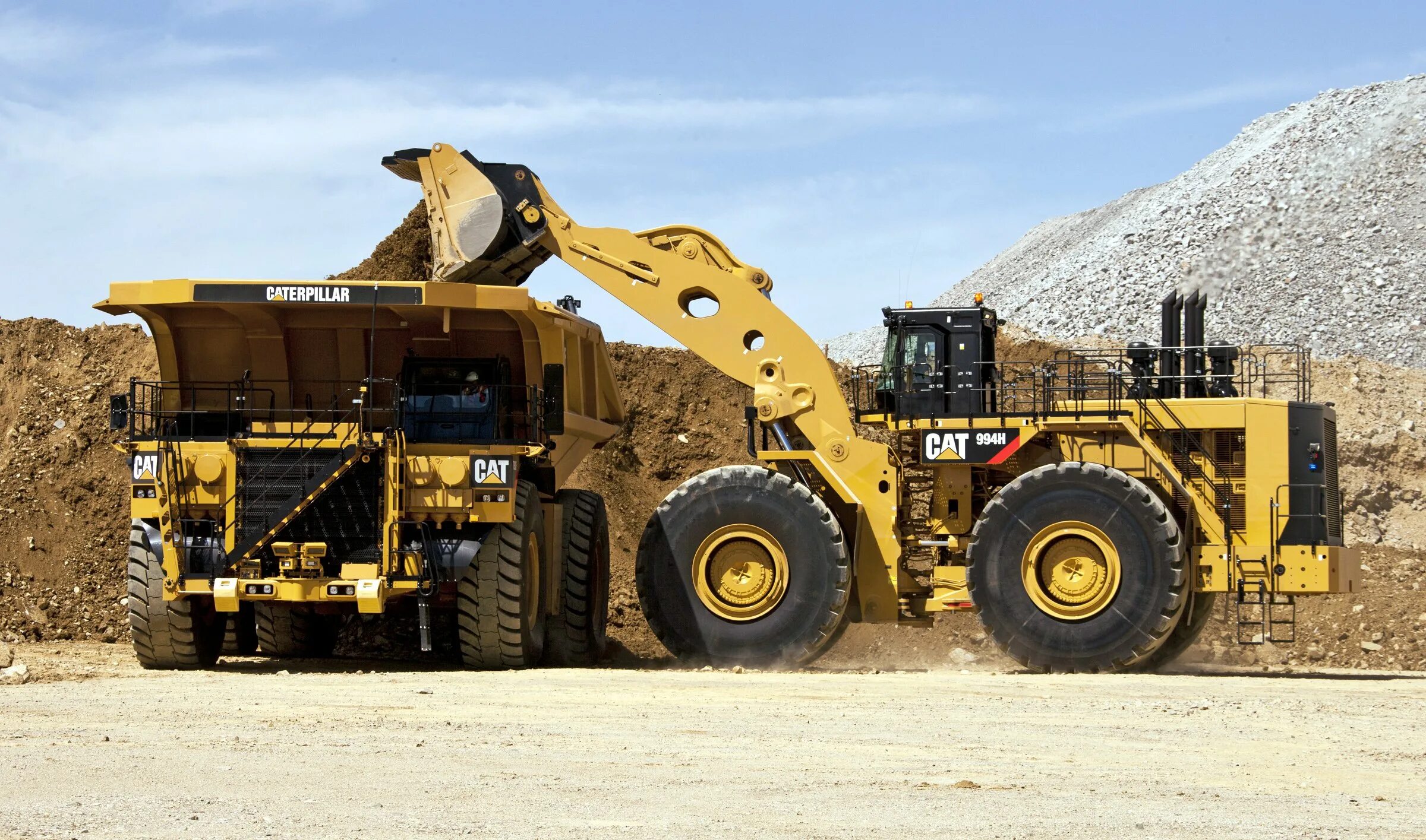 Фронтальный погрузчик letourneau l 2350. Карьерный трактор. Погрузчик caterpillar 994к. Liebherr l586. Погрузчик либхер 586.