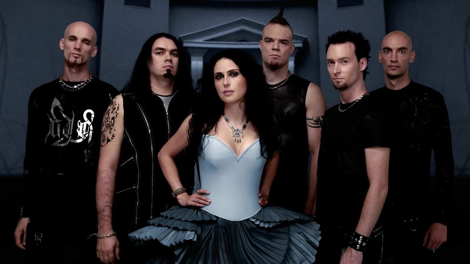 Within temptation тексты. Группа темптейшен. визин темптейшн. солистка группы визин темптейшен. рок группа within temptation.