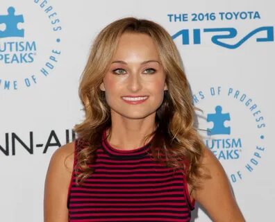 Food Network personality Giada De Laurentiis wears a sleeveless red and bla...