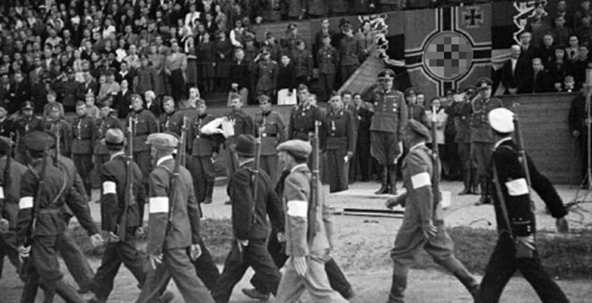 Зверства в Эстонии пособников фашизма в 1941 году. Полицай в Великую отечественную войну.