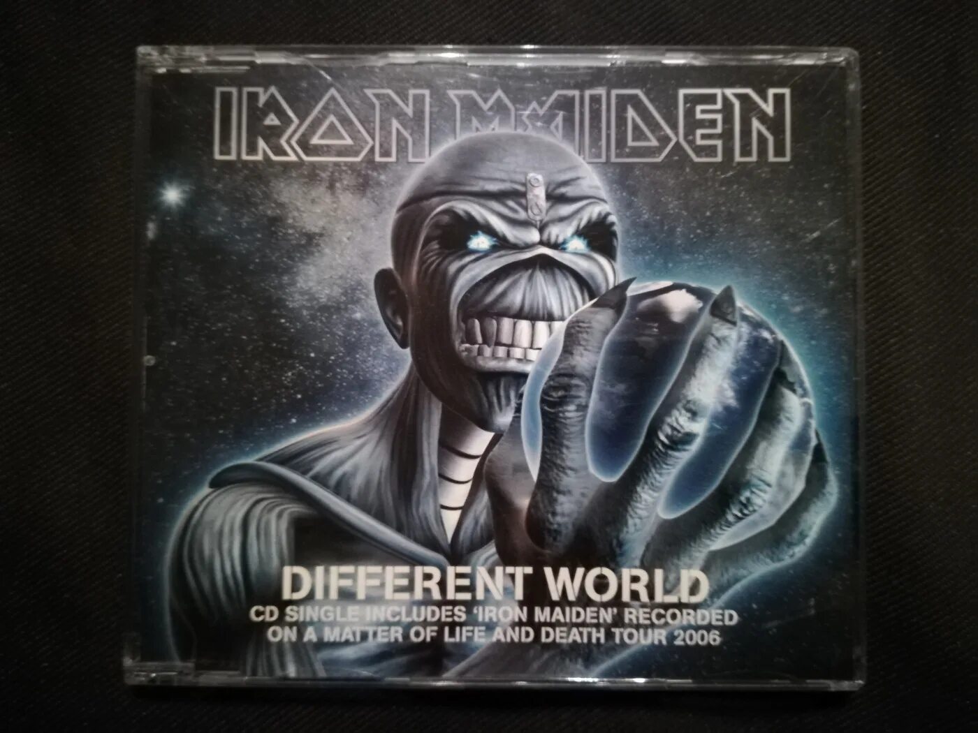 A different world without men. Iron maiden singles. iron maiden different world. iron maiden обложки альбомов картинки.