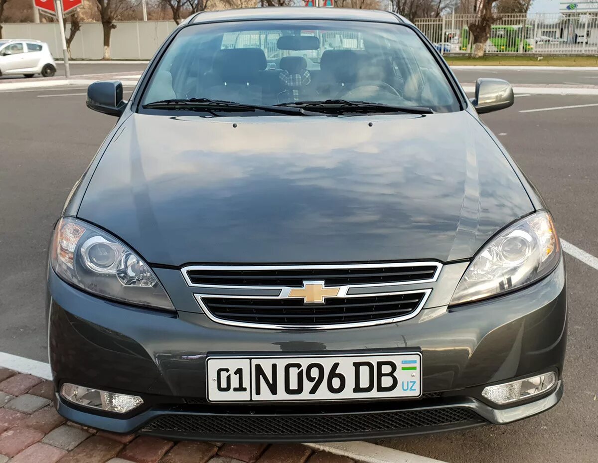 Фото джента. Gentra 1.5 Chevrolet. Шевроле Лачетти Джентра. Фара американка Daewoo Gentra. Chevrolet Gentra американка фара.