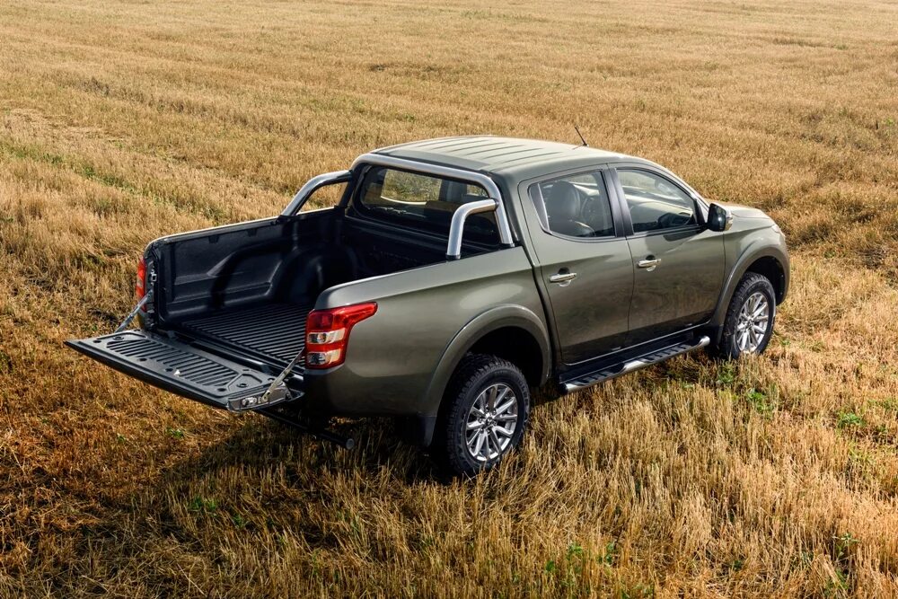 L200 mitsubishi кузова. Мицубиси л200. Джип Митсубиси л200. Мицубиси l200. Мицубиси л200 пикап новый.