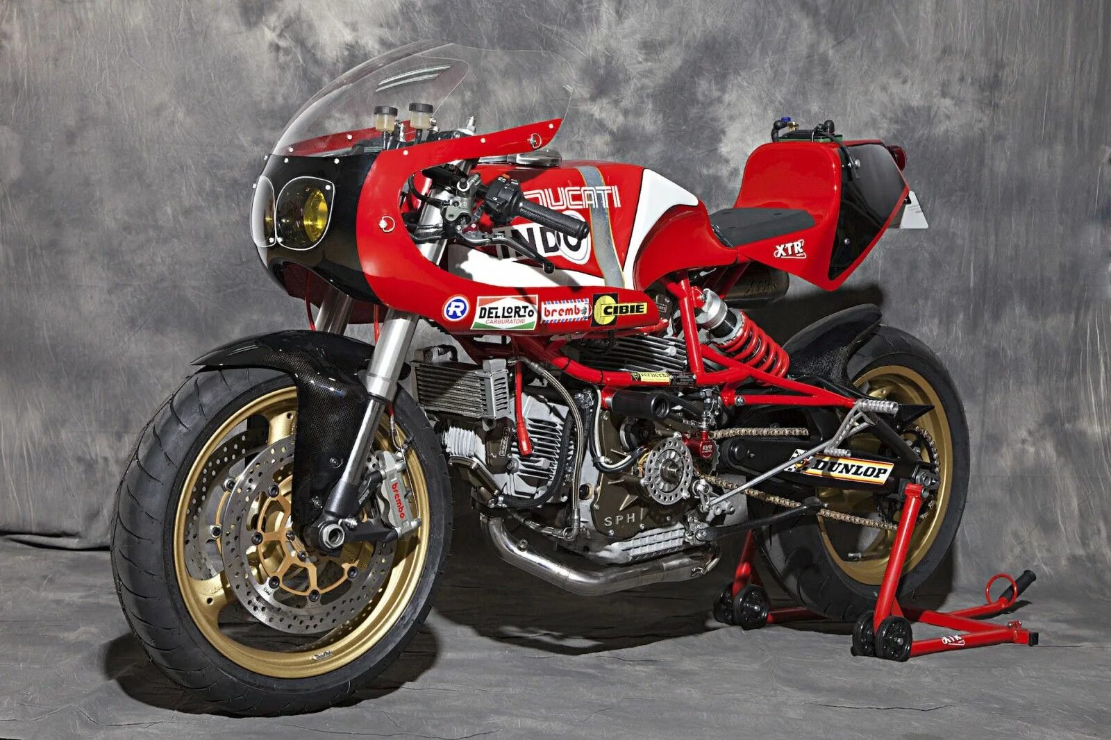 Ducati 600 TL. Гоночный мотоцикл Дукати. Дукати мотоцикл чоппер. Мотоцикл Дукати кастом. Байк х 75 машина