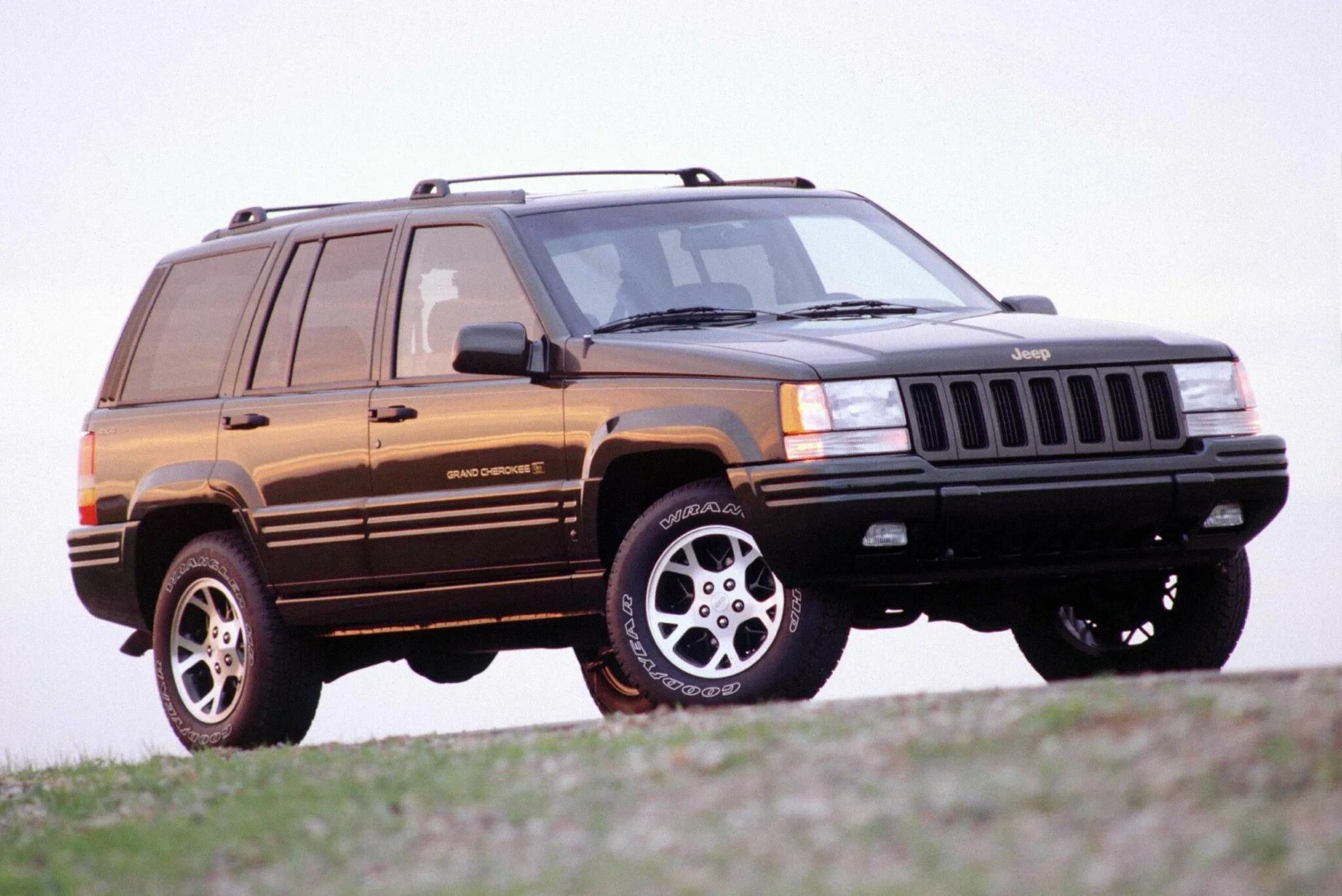 Джип чероки zj. Jeep grand cherokee 4. 2. Джип гранд чероки 1995. Jeep grand cherokee limited 1997.
