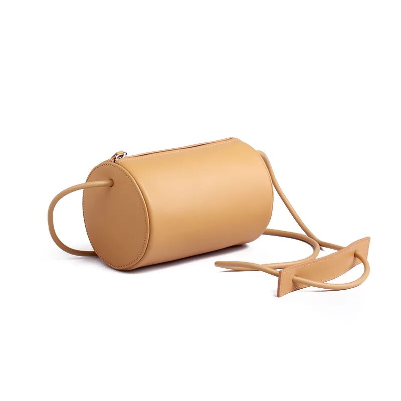 Сумка цилиндр вертикальная. Сумка цилиндрическая женская. Сумка цилиндрической формы. Сумка мужская цилиндрическая. Сумка цилиндр из кожи.