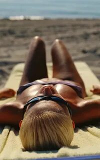 My sister sunbathing
