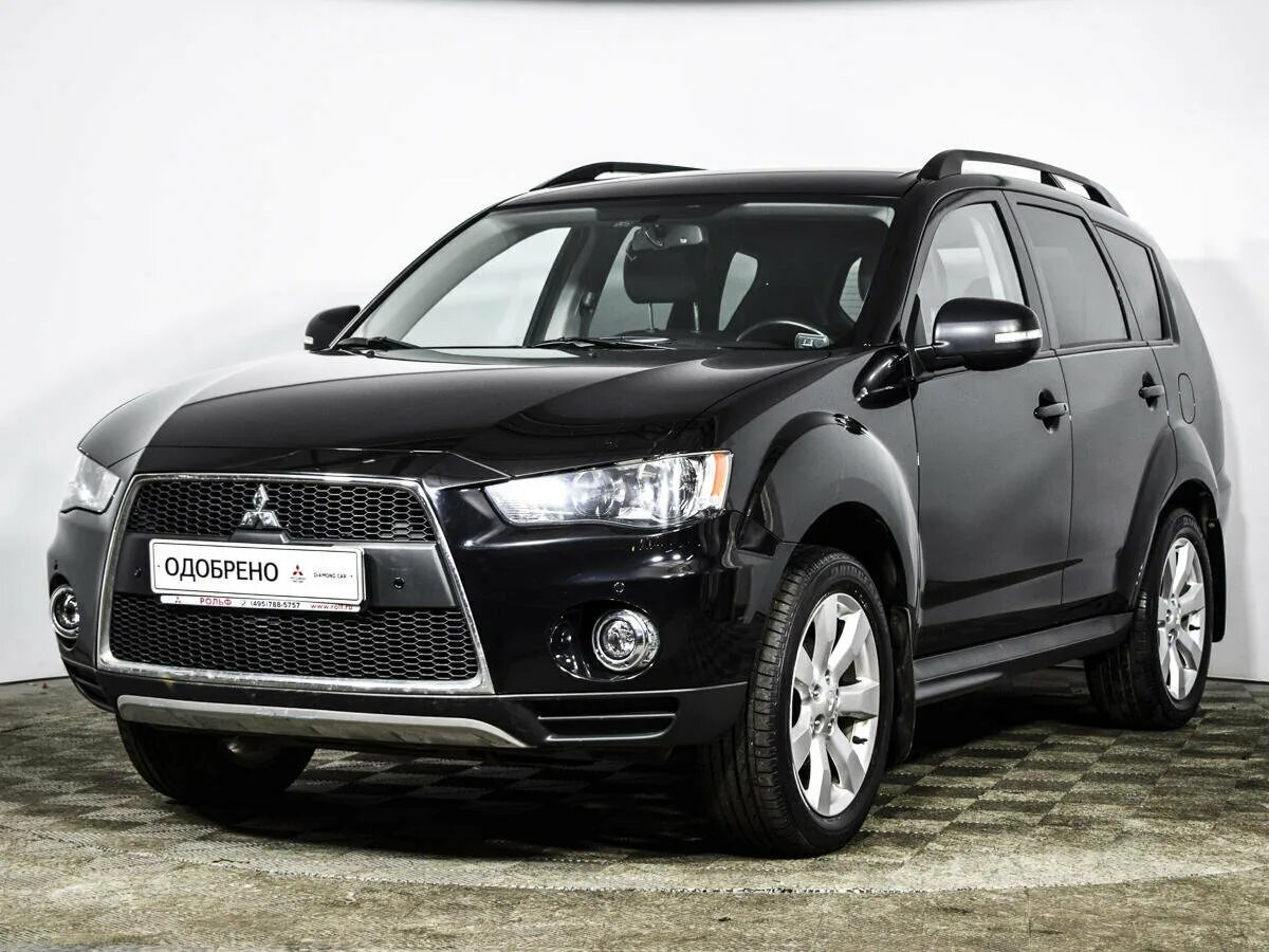 Митсубиси аутлендер 2 купить. Митсубиси Аутлендер ХЛ 2. Mitsubishi Outlander XL 2 поколение. Mitsubishi Outlander 2.4. Mitsubishi Outlander II Рестайлинг.