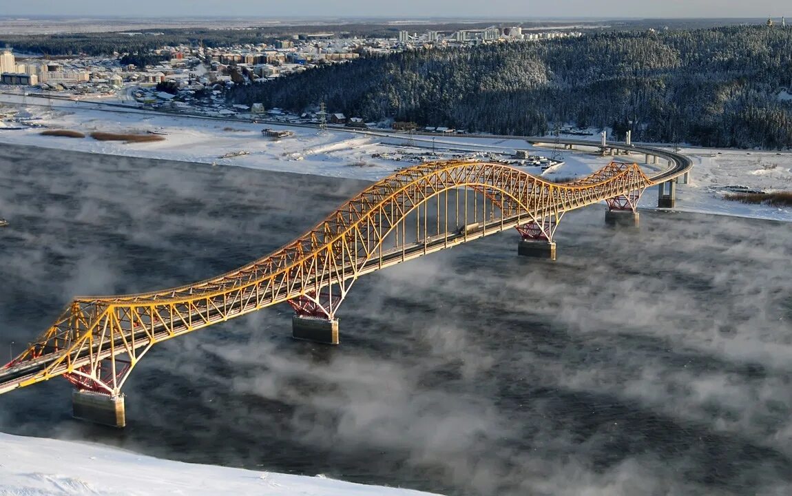 Сколько ушло металла на мост красный дракон. Ханты-Мансийск мост красный дракон. Мост через Иртыш в Ханты-Мансийске. Мост дракона Ханты Мансийск. Красный дракон мост через Иртыш.