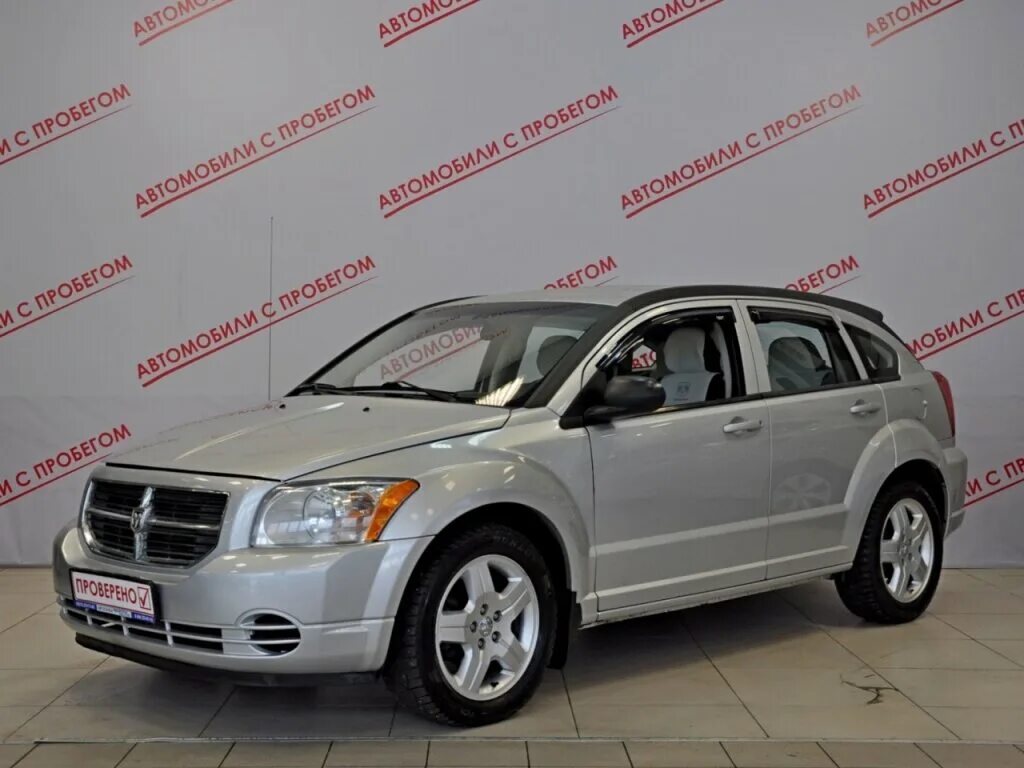 Dodge caliber 2.0. Додж Калибр серебристый.