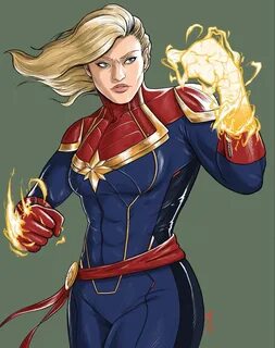 a woman dressed as captain marvel with fire coming out of her hands 
