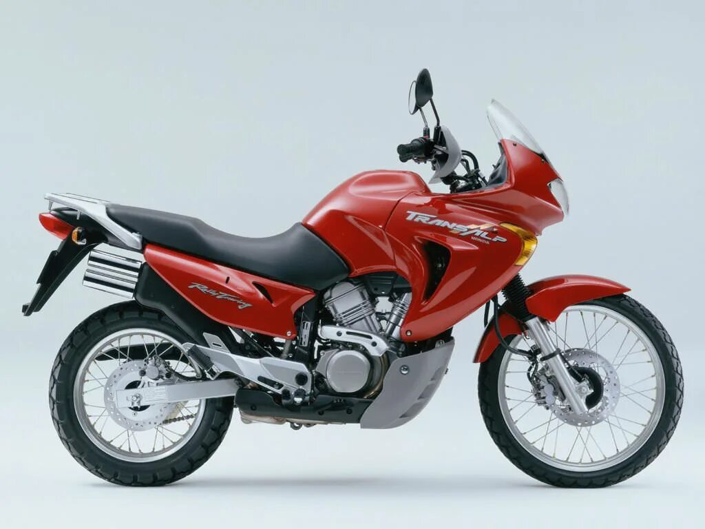 Мотоциклы honda transalp. Фара honda xl 600 1996. Мотоциклы honda transalp. Honda transalp 600. Honda xl650 transalp.
