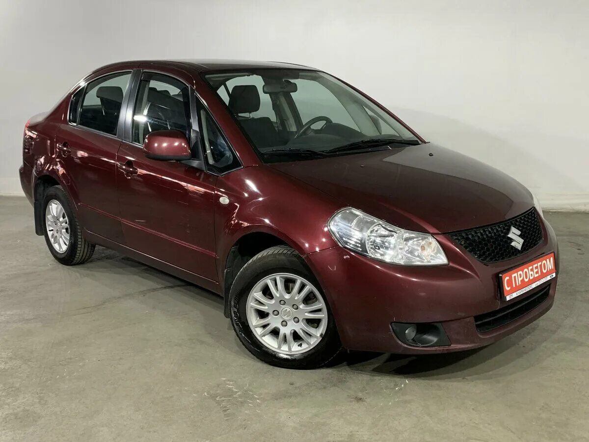 Автомобиль 2008. Сузуки sx4 седан 2008. Сузуки sx4 седан 2008 год. Сузуки sx4 2008г. Сузуки sx4 седан красная.