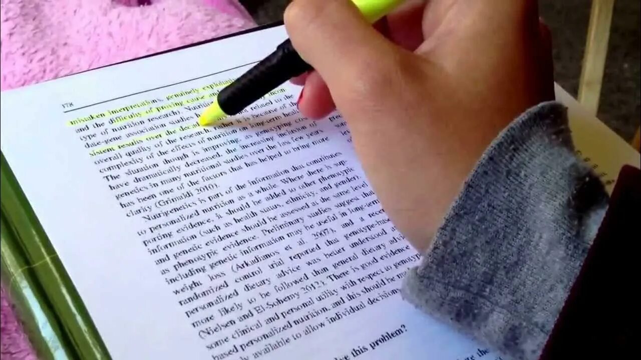 Read these notes. Highlighting book. note taking while reading. making notes. quick reading.